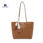 Sophisticated Tan Leather Tote with Silk Scarf Accent