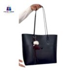Elegant Large Black Tote Bag with Pom-Pom Charm